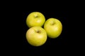 Three Granny Smith Apples on Black Background Royalty Free Stock Photo