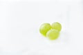 Three grapes close up on a white background Royalty Free Stock Photo