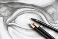 three graphite pencils on drawing of David\'s eye Royalty Free Stock Photo