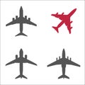 Three gray passenger planes and one red