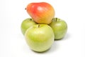 Three green apples and a pear Royalty Free Stock Photo