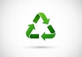 Three green arrows forming a triangular recycling symbol, indicating sustainability and environmenta Royalty Free Stock Photo