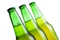 Three green beer bottles isolated Royalty Free Stock Photo