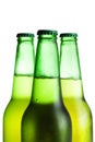 Three green beer bottles isolated Royalty Free Stock Photo