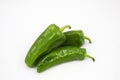 Three green bell peppers