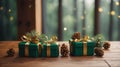 Three green boxes with gold ribbons on top of a wooden table with pine cones. Royalty Free Stock Photo