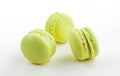 Three green cake macaron on white background, maccarone sweet dessert