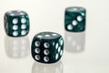 Three green casino dice with white background Royalty Free Stock Photo