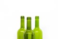 Three green empty wine bottles on a white background Royalty Free Stock Photo