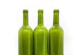 Three green empty wine bottles on a white background Royalty Free Stock Photo