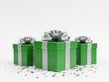 Three green gift boxes with silver ribbons isolated on white background Royalty Free Stock Photo