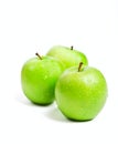 Three green granny smith apples Royalty Free Stock Photo