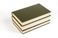 Three Green hardcover books on a white background. Stack of closed books