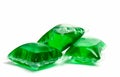 Three green laundry detergent capsules Royalty Free Stock Photo