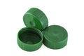 Three green plastic bottle caps Royalty Free Stock Photo