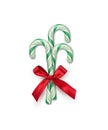Three green striped candy canes with red bow isolated on white background. Vector Christmas and New Year design element. Royalty Free Stock Photo