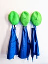 Three green Tams, and Three Blue Smocks Royalty Free Stock Photo