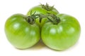 Three green unripe tomato isolated on white background Royalty Free Stock Photo