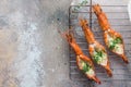 Three griled prawns with sauce, top view, copy space Royalty Free Stock Photo