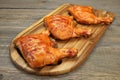 Three Grilled BBQ Chicken Leg Quarter On Wood Board Royalty Free Stock Photo