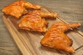 Three Grilled BBQ Chicken Leg Quarter On Wood Board Royalty Free Stock Photo