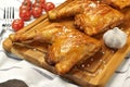 Three Grilled BBQ Chicken Leg Quarter On Wood Board Royalty Free Stock Photo