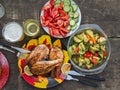 Three grilled salmon steaks with a side dish of baked vegetables Royalty Free Stock Photo