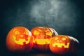 Three halloween Jack O` Lantern pumpkins