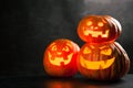 Three halloween Jack O` Lantern pumpkins