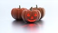 Three Halloween Pumpkins with a Bad One in front Royalty Free Stock Photo