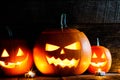 Three Halloween Pumpkins and candles Royalty Free Stock Photo