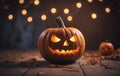 Three Halloween pumpkins on table, carved into jackolanterns