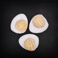 Three halves of a boiled quail eggs