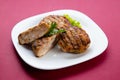 Burger patties cooked and served on white plate Royalty Free Stock Photo