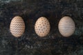 Three hand decorated Easter eggs, happy easter