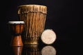 Three handmade Djembe drums isolated on black Royalty Free Stock Photo