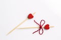 Three handmade heart cupcake toppers on white background Royalty Free Stock Photo