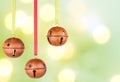 Three hanging Christmas or holiday ornaments Royalty Free Stock Photo