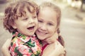 Three happy children playing on the road Royalty Free Stock Photo