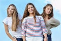 Three happy girls stand together Royalty Free Stock Photo