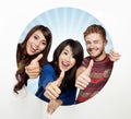 Three happy student come out from a white circle, thumbs up Royalty Free Stock Photo