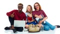 Three happy young teenager students with thumbs up isolated on w Royalty Free Stock Photo