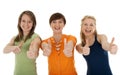 Three happy young women giving thumbs up Royalty Free Stock Photo