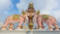 Three head pink elephants statue