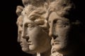 Three headed roman-asian ancient statue of beautiful women Royalty Free Stock Photo