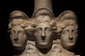 Three headed roman-asian ancient statue of beautiful women Royalty Free Stock Photo