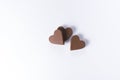 Three heart shaped chocolates.