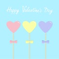 Three hearts with bows on sticks. Pink blue yellow pastel colors. Happy Valentines Day. Love greeting card emplate. Flat design. B