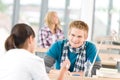 Three high school students in classroom Royalty Free Stock Photo