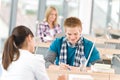 Three high school students in classroom Royalty Free Stock Photo